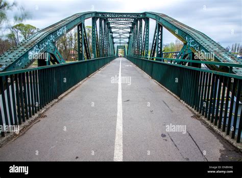 Old Metal Bridge Over The Small River Stock Photo Alamy