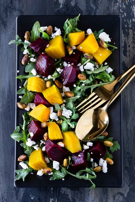 Easy Roasted Beet Salad With Goat Cheese Arugula And Pistachios Garnish With Lemon