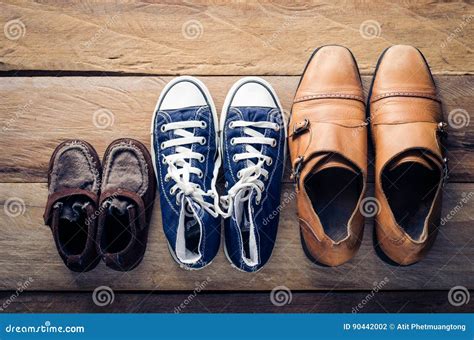 Three Pairs Of Shoes Three Stages Of The Growth Stock Photo Image Of