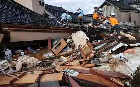 Japan Earthquake Woman In 90s Found Alive Under Rubble Five Days Later