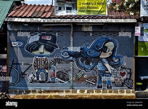 Shutter art. Painting on a shop metal shutter Stock Photo - Alamy