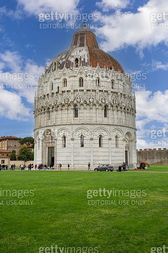 Tourists Before Pisa Baptistery Of St John Duomo Square Of Pisa