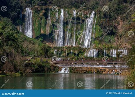 View of the Jiulong Waterfall Streaming Down To a Lake Stock Image ...