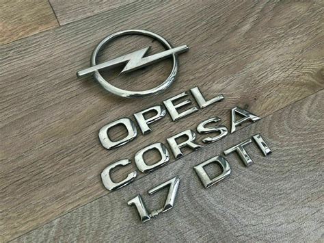 Monogrammes insignes logos badges emblèmes sigles OPEL CORSA 1 7 DTI eBay