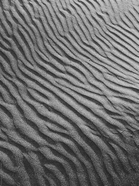 Patterns On Beach Sand At Dusk Close Up Del Colaborador De Stocksy