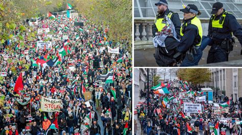 Police Arrest 13 As Tens Of Thousands Of Protesters March Through