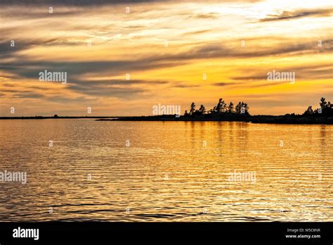 A gorgeous golden sunset on Georgian bay Stock Photo - Alamy