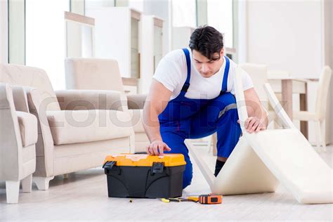 Furniture Repairman Working In Store Stock Image Colourbox