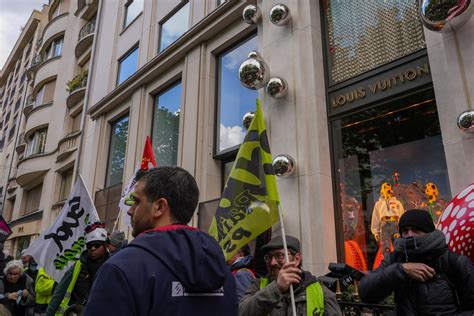 In Paris, Protesters Against Macron’s Pension Plan Storm the LVMH Headquarters | Vogue