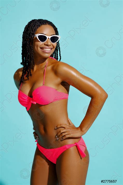 Sexy Woman In Swimsuit And Sunglasses In Studio Stock Photo 2775657