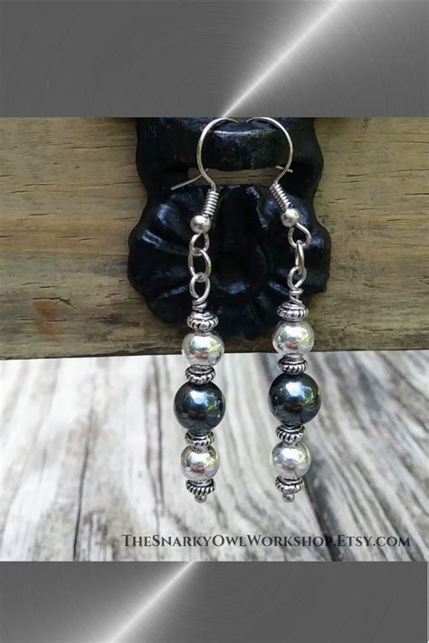 The Classic Elegance Of Silver And Hematite Are United In This Long