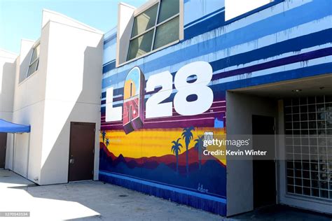 A mural reveals the new LA28 logo, with the "A" designed by Orlando ...