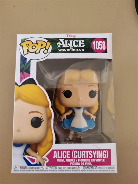 1058 Alice Curtsying Disney Alice In Wonderland Funko POP With POP