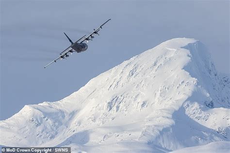 Royal Marine Commandos Perform Parachute Jump Onto Frozen Arctic Lake