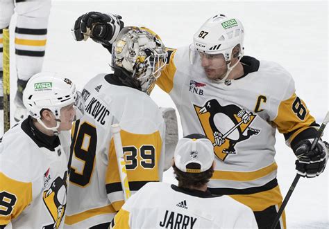 Penguins’ goalie tandem faring well while covering for defensive lapses ...