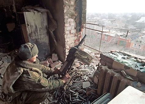 First Chechen war, a Russian soldiers fires his AGS-30 automatic 30mm ...