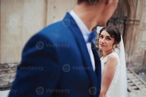 Wedding Portrait Of A Happy Couple Stand And Kissing 6655551 Stock