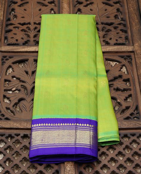 Green Kancheepuram Silksaree With Buttas Contrast Intricate Pallu 1