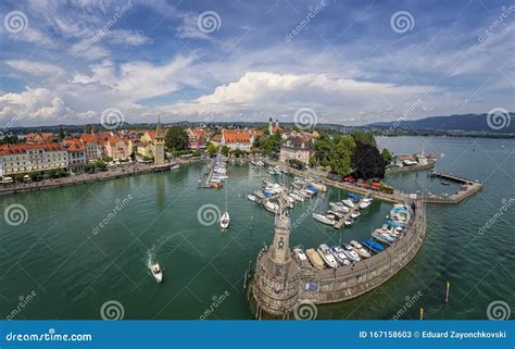 Harbor On Lake Constance With A Statue Of A Lion At The Entrance In