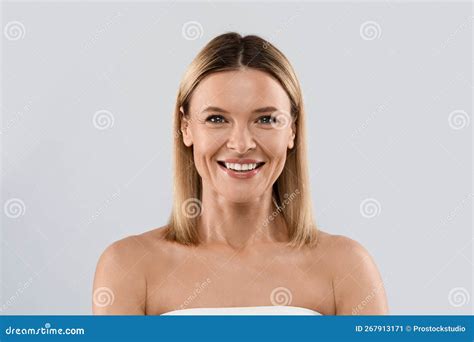 Portrait Of Attractive Half Naked Middle Aged Blonde Woman Stock Image