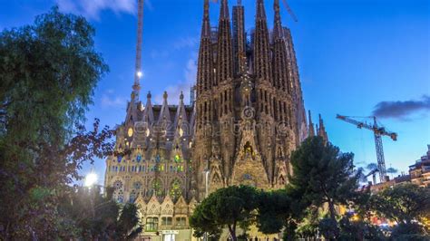 Sagrada Familia A Large Church In Barcelona Spain Day To Night