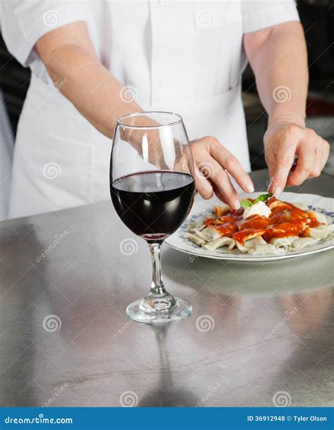 Male Chef Garnishing Pasta Dish Stock Photo Image Of Preparation