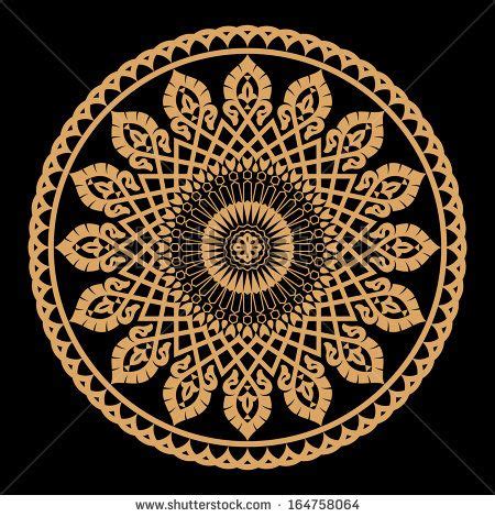 A Golden Circular Ornament On A Black Background