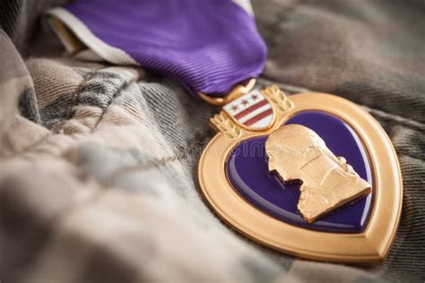 Purple Heart War Medal On Camouflage Material Stock Image Image Of