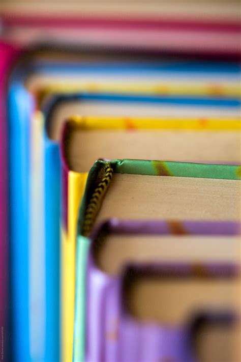 "Stacked Colorful Books" by Stocksy Contributor "Pixel Stories" - Stocksy