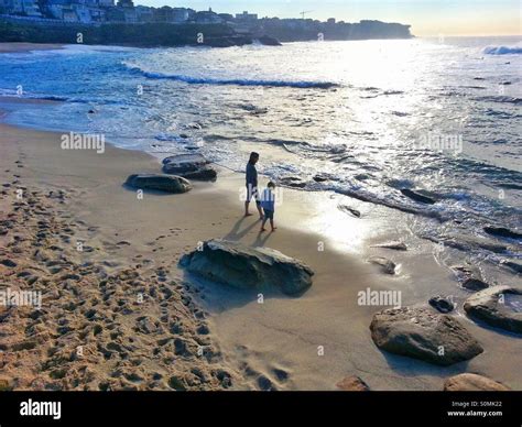 My And Daughter Stroll On The Beach Stock Photo Alamy