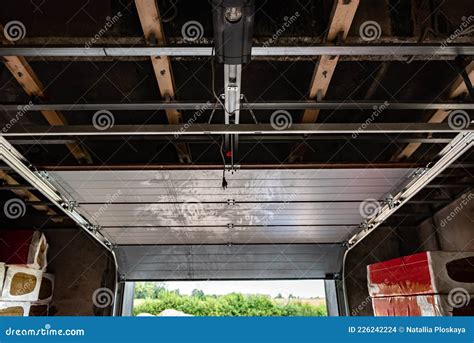 Installation Of Automatic Sectional Garage Door Stock Photo Image Of