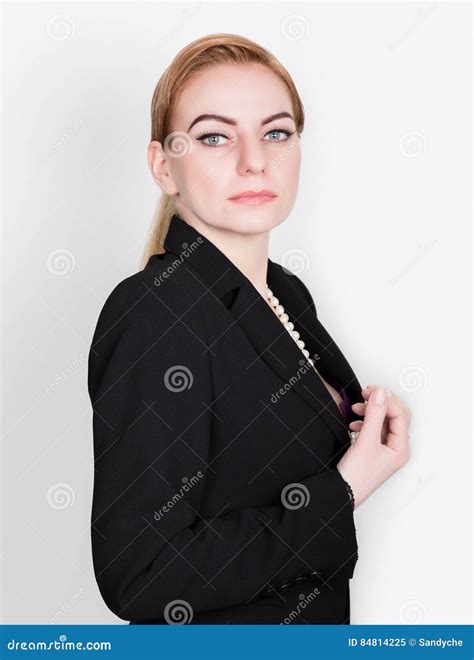 Attractive And Energetic Business Woma In A Suit On Naked Body Smiling