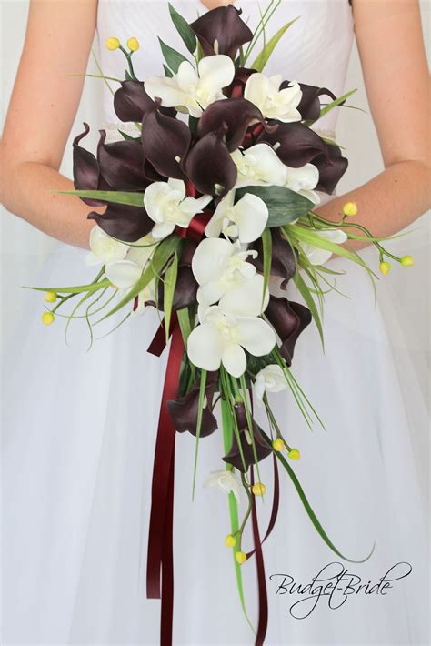 This Stunning Brides Bouquet Is A Cascading Bouquet Made With Wine