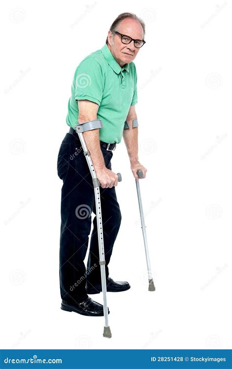 Physically Disabled Old Man With Crutches Royalty Free Stock Photos