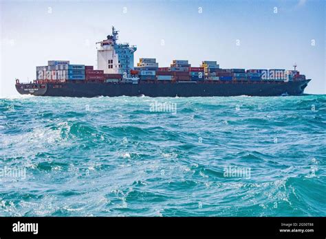 huge container ship sailing on high seas in calm weather Stock Photo ...