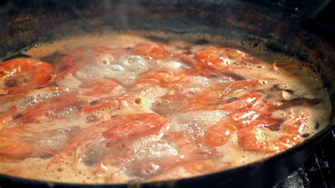 Shrimp in boiling water. Filmed on a high-speed camera at 1000 fps ...