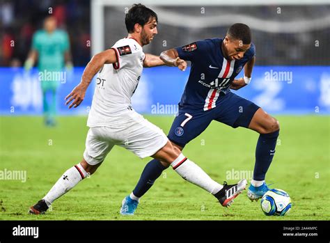 Kylian Mbappe Right Of Paris Saint Germain Challenges Clement Grenier