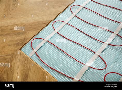 Installation Of Electric Underfloor Heating System Indoors Closeup