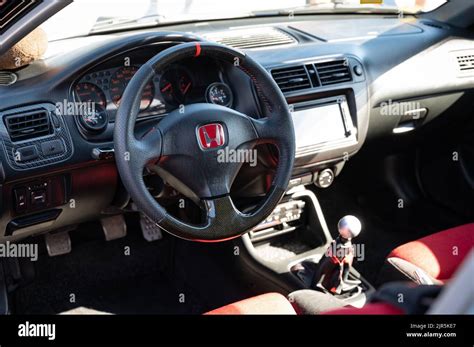 The black and red interior of the Japanese sports car Honda Civic EK ...