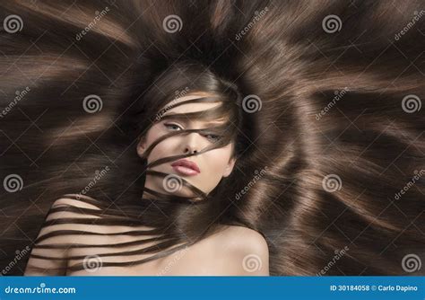 Brunette With Long Smooth Hair And Sensual Eyes Stock Photo Image Of Lying Close