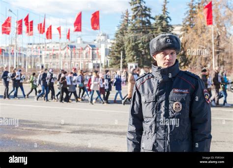 Russian Police Officer In Uniform Standing In The Cordon During The