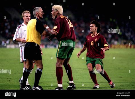 Portugal S Abel Xavier C Argues With Referee Gunter Benko L After