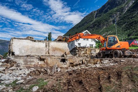 Premium Photo | Demolition of the old house for the construction of new ...