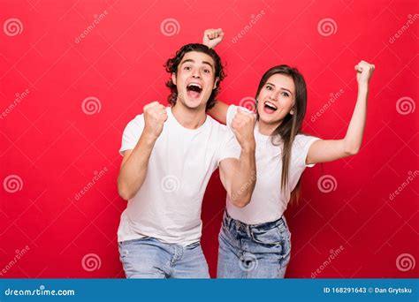 Photo Of Cheerful Couple Of Two People Rejoicing With Victory Of