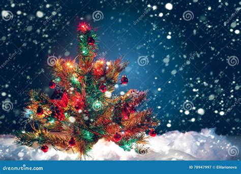 Christmas Tree with Garland of Lights and Decorations. Stock Image ...