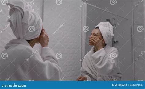 Woman With White Towel On Her Head Massaging Her Face After Shower Stock Video Video Of