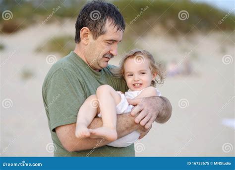 Grandfather Holding His Granddaughter Stock Image Image Of Older