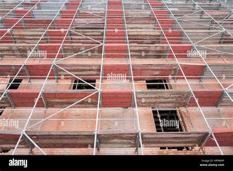 Scaffolding At Historic Brick Wall Building Currently Under