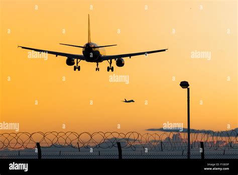 A British Airways Airbus A319 Lands On Heathrow Airports Runway 27r As