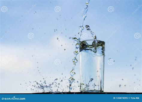 Water Dropping Into The Glass Stock Image Image Of Bubble Water